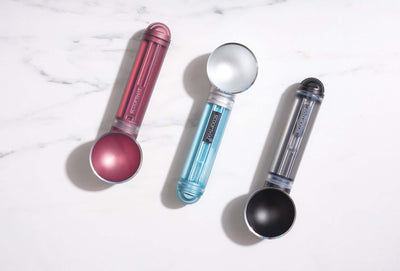 Three colorful ScoopTHAT! Radii thermo ring ice cream scoops with enhanced design for effortless scooping.