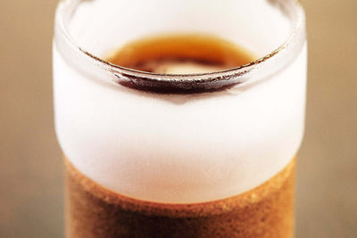 Frosted Chill Glass with a cold beverage, featuring double-walled design to keep drinks ice-cold without dilution.