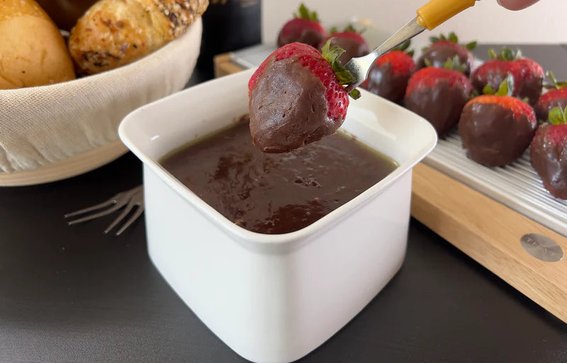 Fondue Bowl with silicone insulated base for melted cheese, chocolate or dips.