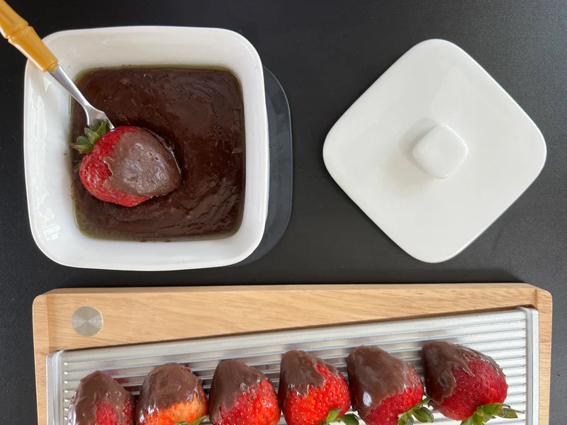 Fondue Bowl with silicone insulated base for melted cheese, chocolate or dips.