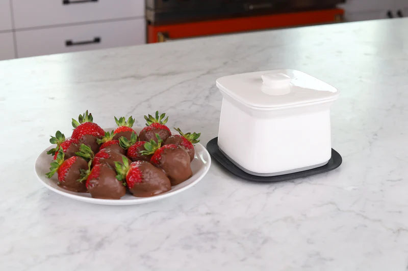 Fondue Bowl with silicone insulated base for melted cheese, chocolate or dips.