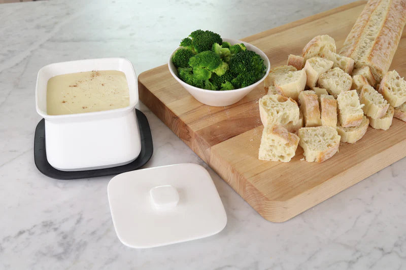Fondue Bowl with silicone insulated base for melted cheese, chocolate or dips.
