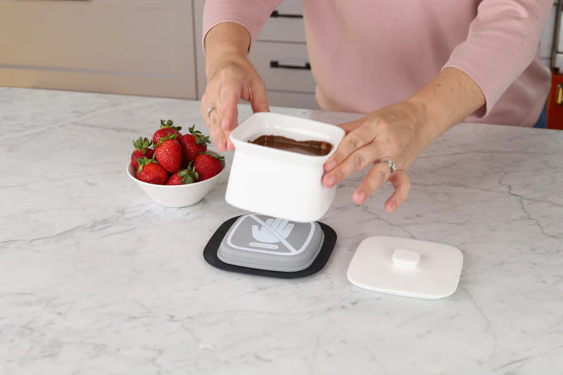 Fondue Bowl with silicone insulated base for melted cheese, chocolate or dips.