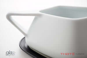 HeatTHAT! Gravy insulated gravy boat for keeping sauce hot, featuring a sleek design with a silicone-insulated base.